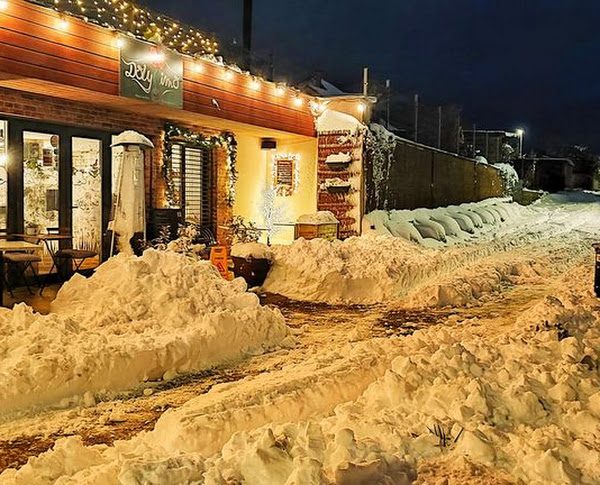 Zasnežené Dolyssimo s vianočnými svetielkami